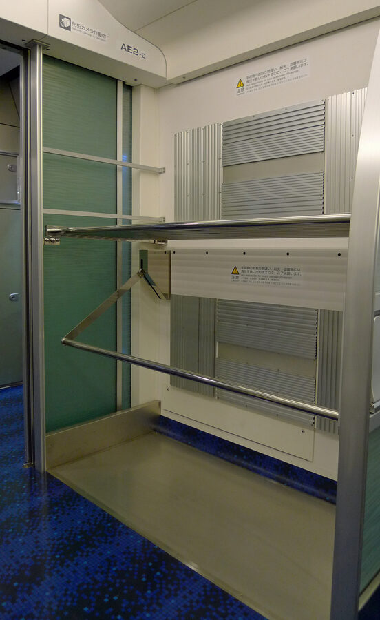Keisei AE series luggage racks at the end of the car
