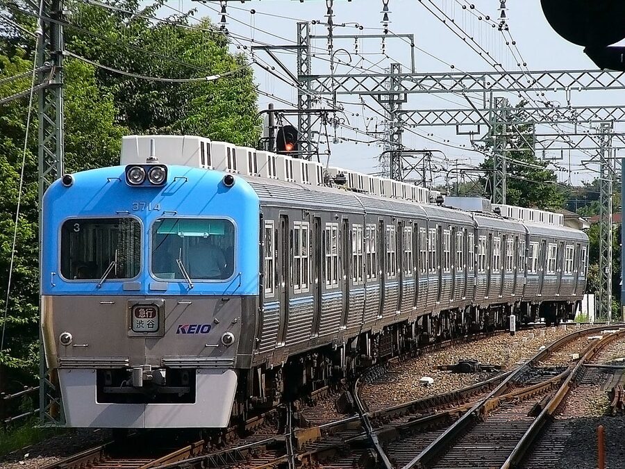 Sky-blue Keio 3000 series leaving Kichijoji Station