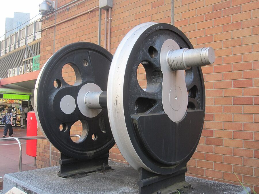 A pair of D51 driving wheels preserved outside Shimbashi Station