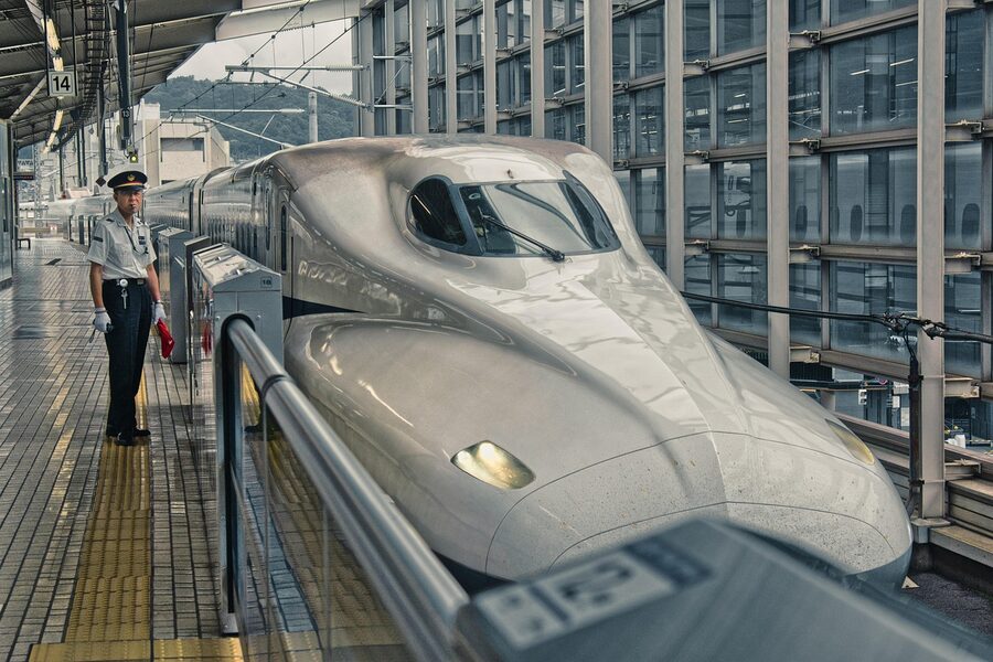 Modern Shinkansen bullet train at a station