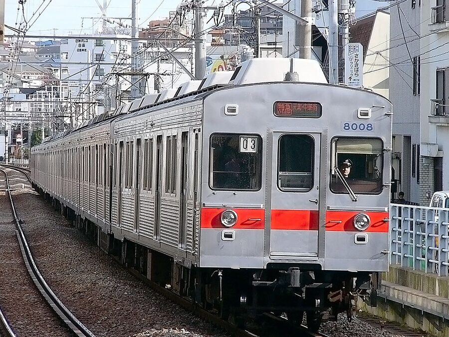 Tokyu 8000 series in the modified red-band scheme, photographed in service on the Toyoko Line