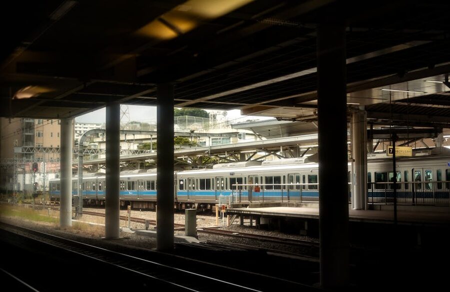 Train at Yokohama train station with platform crowds visible