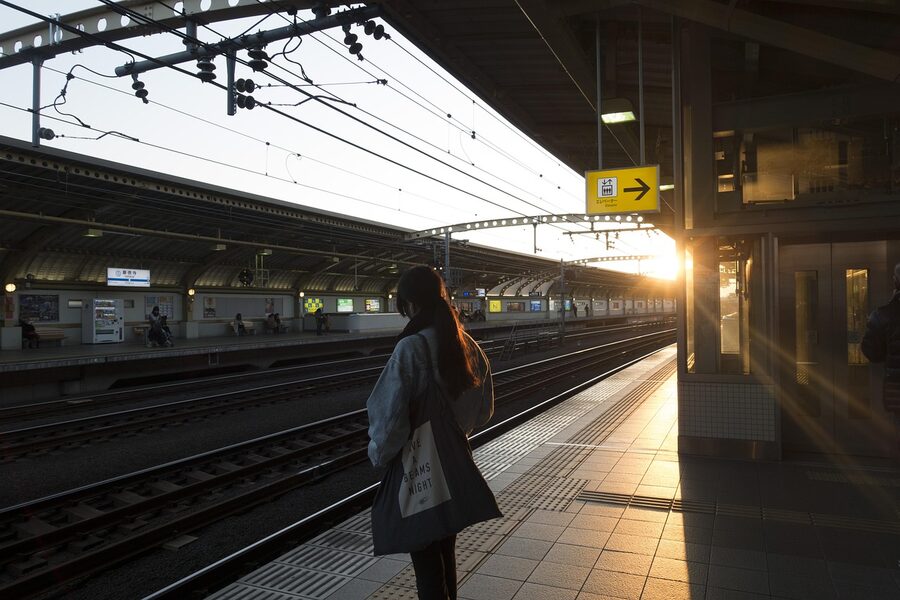 A Tokyo train station with rails overhead