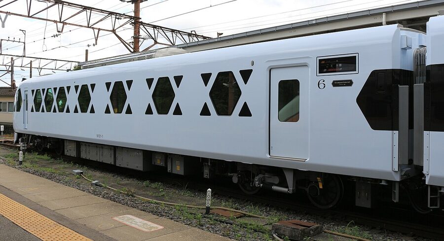 Tobu N100 series Spacia X at Tobu Nikko Station in white Toshogu-inspired livery