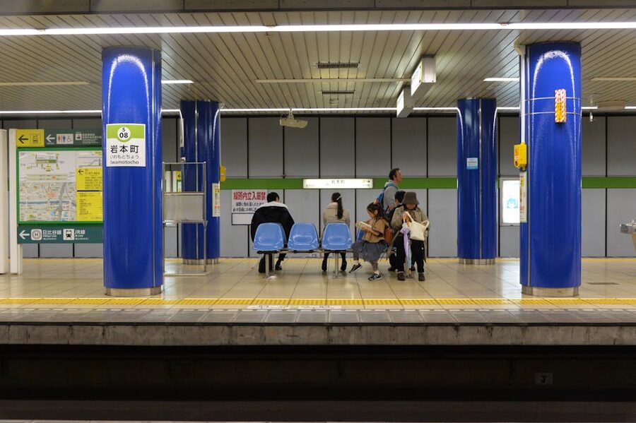 A family at Iwamotocho Station on the Toei Shinjuku Line