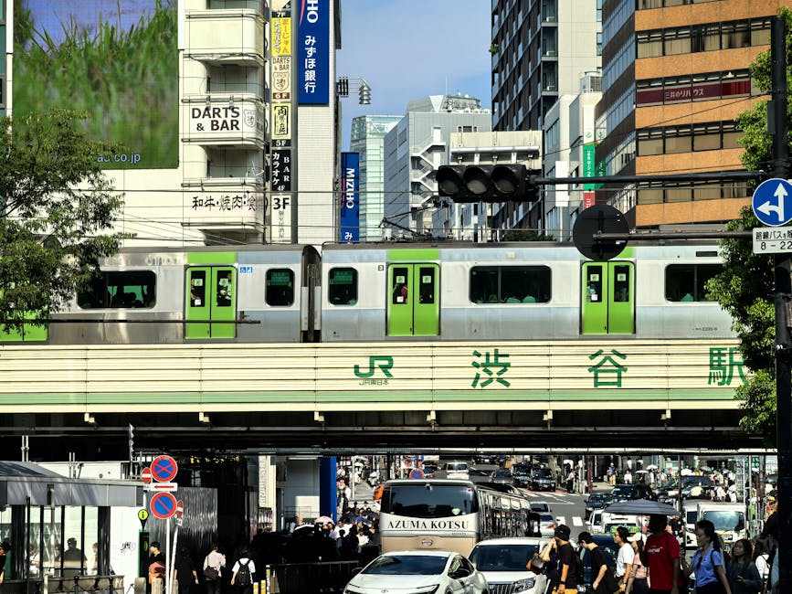 Shibuya Station forecourt with trains visible