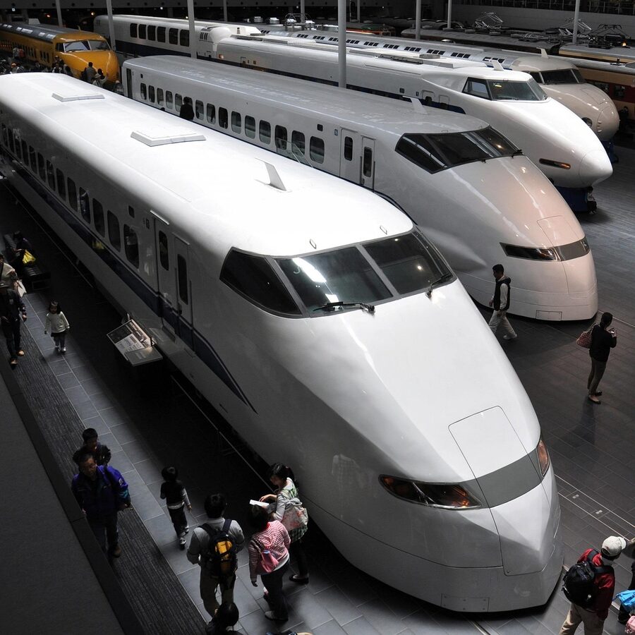 Tokyo train station platform with train arriving